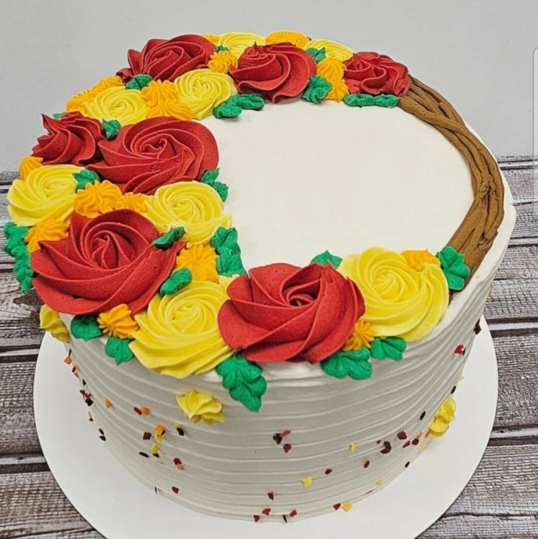 Red and yellow buttercream rose cake
