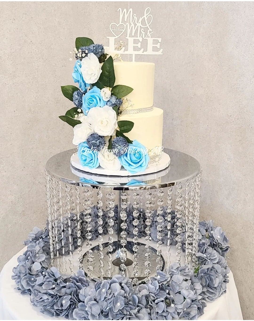 Blue floral tiered celebration cake