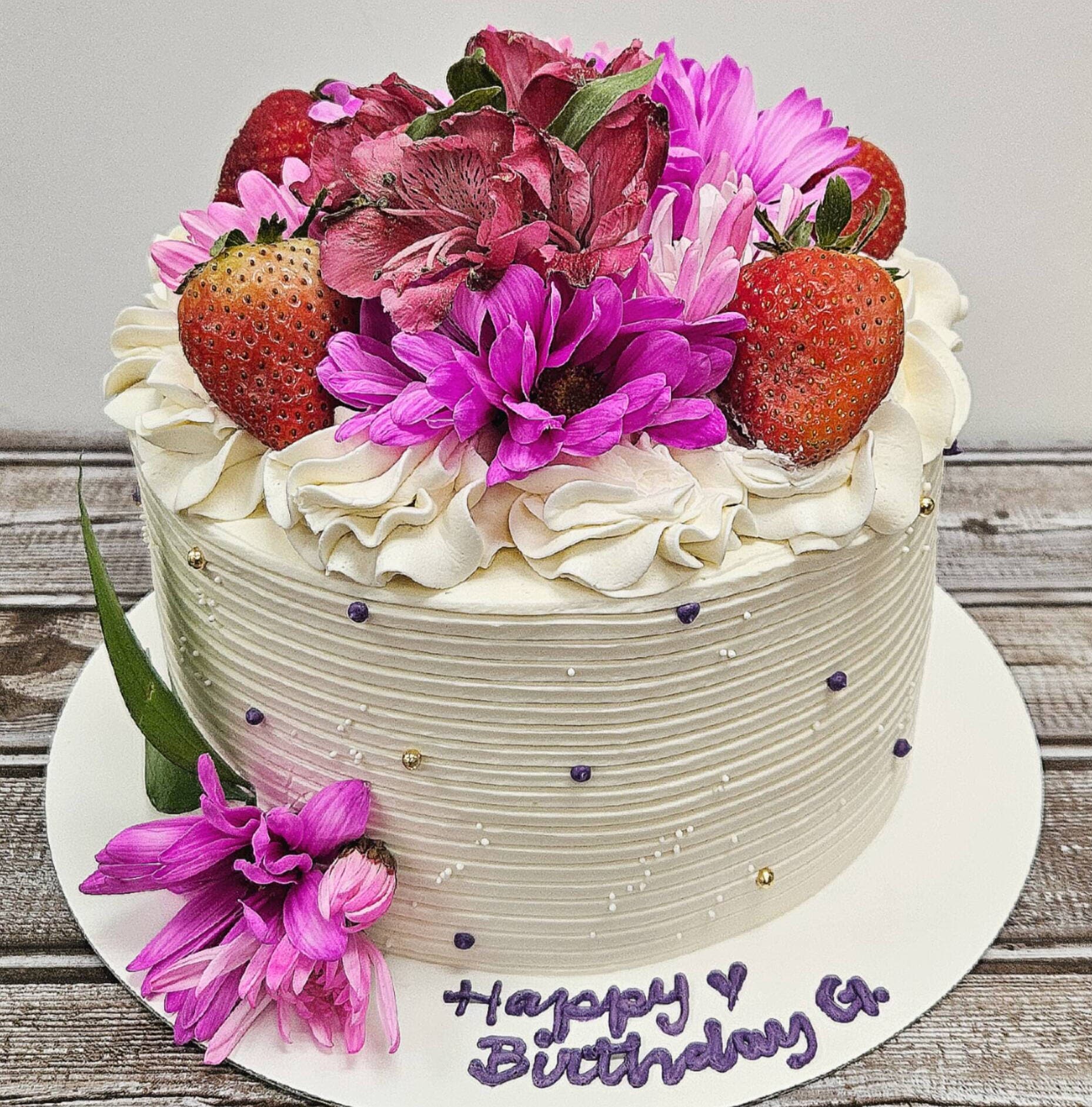 Pink tropical flower birthday cake